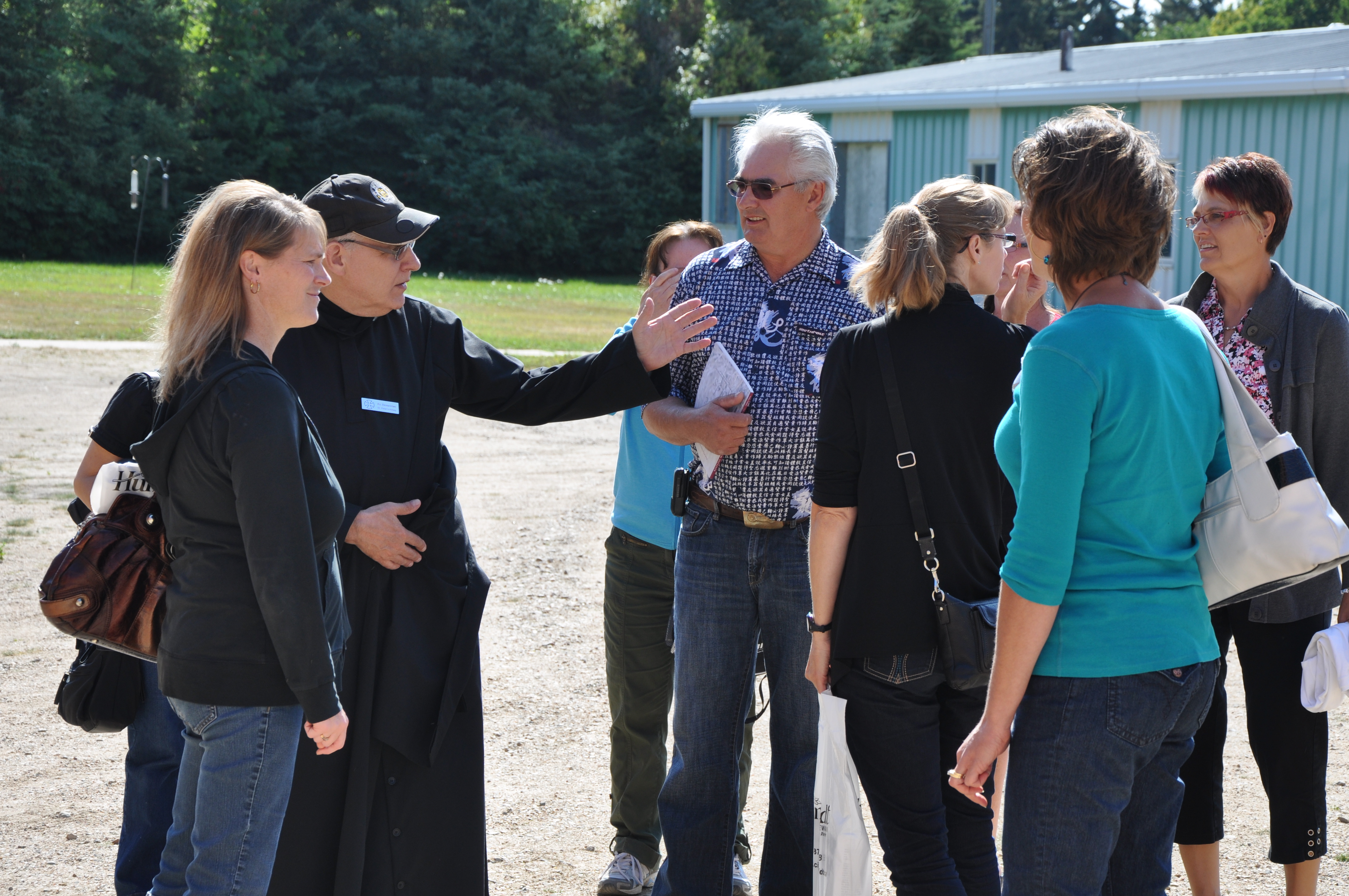 Fr. Demetrius Wasylyniuk, OSB leads a tour of St. Peter's Abbey and College.
